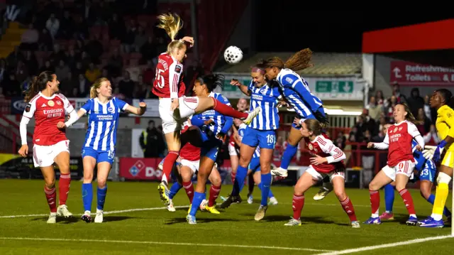 Blackstenius wins a header in a crowded area