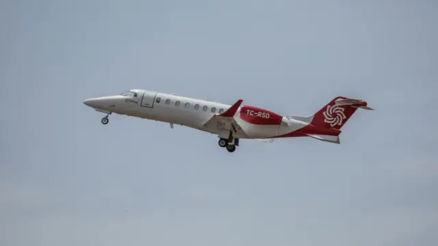 A plane carrying some of the people believed infected with hantavirus passengers from the cruise ship MV Hondius, takes off from the Nelson Mandela International airport of Praia, the capital of Cape Verde, on May 6, 2026
