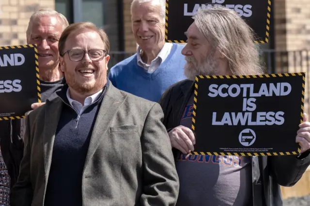 Reform UK Scotland's Thomas Kerr (left) with party supporters in Liberton, Edinburgh, on the last day of campaigning ahead of the Holyrood elections on Thursday