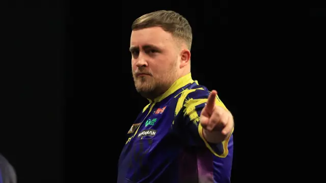 Luke Littler reacts during his match against Jonny Clayton on night fourteen of the BetMGM Premier League 2026 at First Direct Bank, Leeds