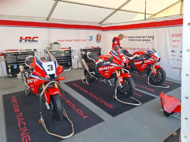 Dean Harrison's Hondas lined up in the Honda Racing team awning