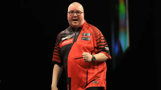 Stephen Bunting during his match against Gian van Veen on night fourteen of the BetMGM Premier League 2026 at First Direct Bank, Leeds.