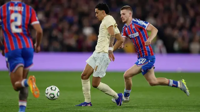 Isaque of FC Shakhtar Donetsk is challenged by Adam Wharton of Crystal Palace
