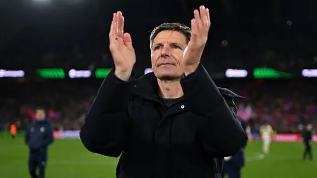 Oliver Glasner, Manager of Crystal Palace, applauds the fans f