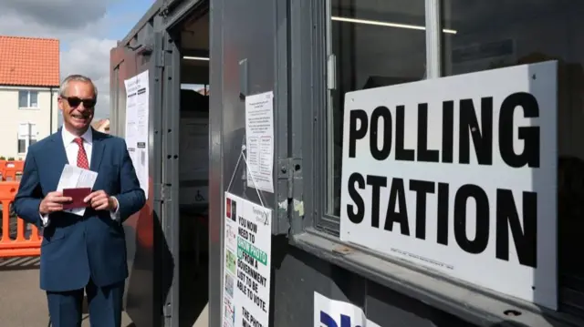 Britain's Reform UK leader Nigel Farage poses outside a polling station as he arrives to vote during local elections in Walton-on-the-Naze, Britain, May 7, 2026