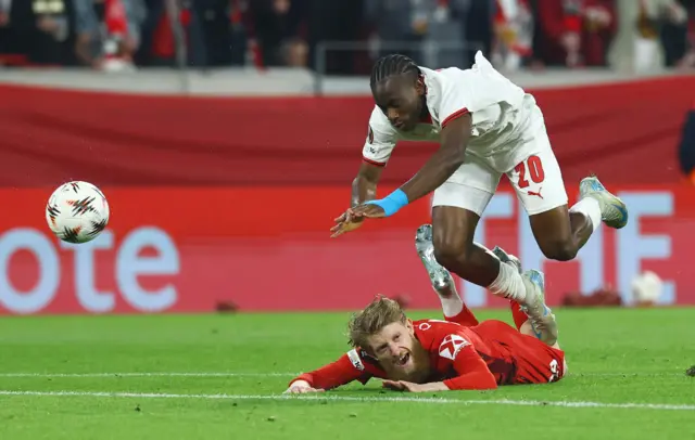 S.C. Braga's Mario Dorgeles fouls SC Freiburg's Jan-Niklas Beste