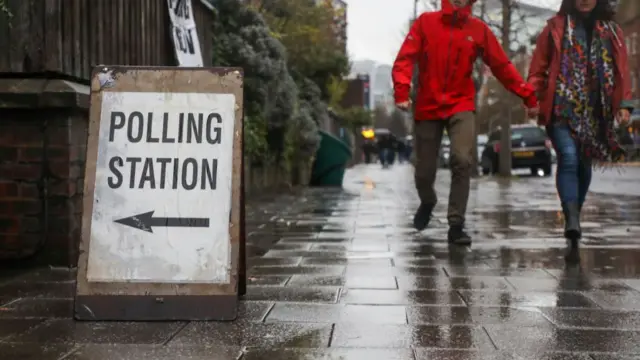 People come to vote at a polling station in London in the 2019 UK general election