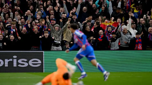 Fans celebrate as Yeremy Pino of Crystal Palace celebrates after scoring