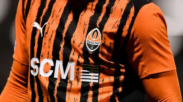 A detailed view of the Shakhtar jersey and crest