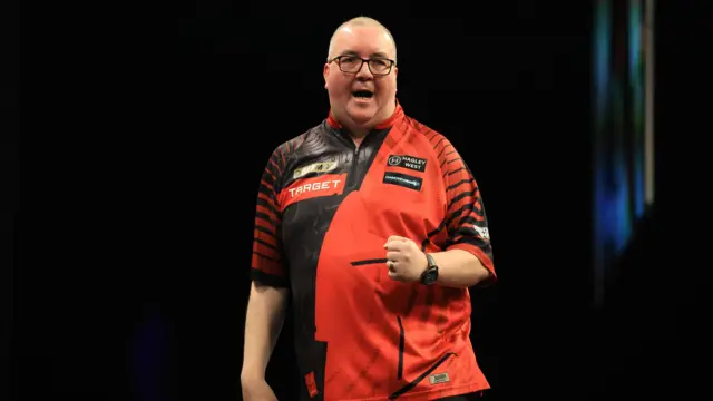 Stephen Bunting reacts during his match against Luke Humphries on night fourteen of the BetMGM Premier League 2026 at First Direct Bank, Leeds