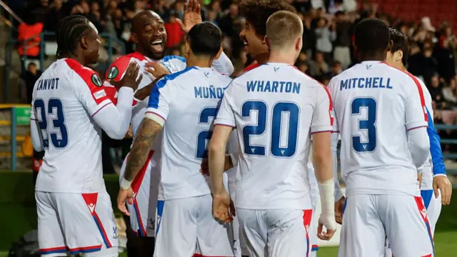 Crystal Palace's French striker #14 Jean-Philippe Mateta (2L) celebrates the team's first goal scored by Crystal Palace's Senegalese midfielder #07 Ismaila Sarr