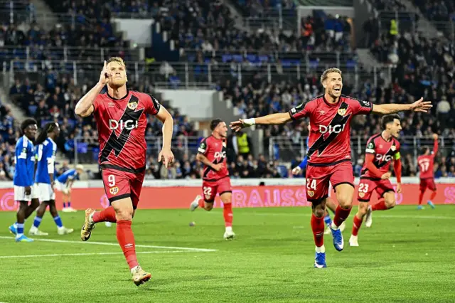 Rayo Vallecano's Brazilian forward #09 Alexandre Zurawski "Alemao" (L) celebrates with teammate Rayo Vallecano's French defender #24 Florian Lejeune