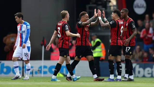 : Evanilson of AFC Bournemouth celebrates with teammates after Jefferson Lerma of Crystal Palace (not pictured) scored an own goal