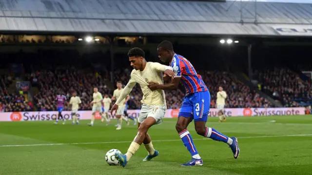Vinicius Tobias of FC Shakhtar Donetsk battles for possession with Tyrick Mitchell of Crystal Palace