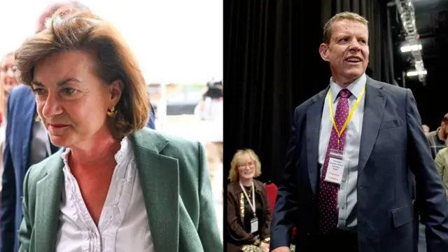 Eluned Morgan in a green suit on the left while