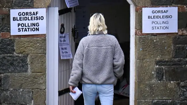 A voter going to the polls