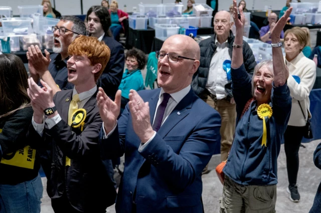 Scottish First Minister John Swinney and other SNP supporters celebrate election wins in Perth