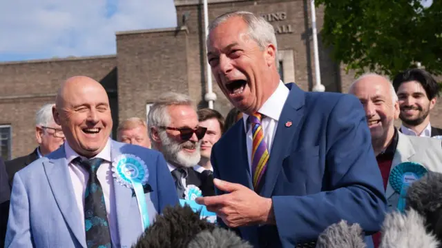 Farage speaks to reporters in Havering