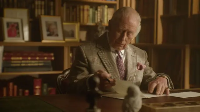 King Charles writing a letter