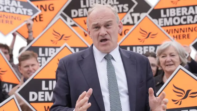 Ed Davey speaks to party campaigners and activists at a thank you party at Guildfordians Rugby Football Club in Guildford, Surrey,
