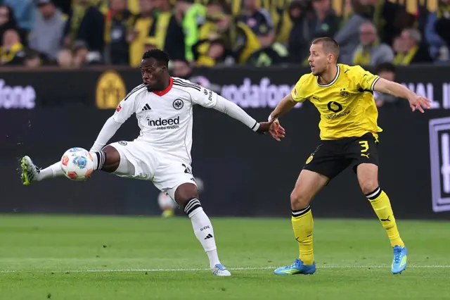 Arnaud Kalimuendo of Eintracht Frankfurt & Waldemar Anton of Borussia Dortmund