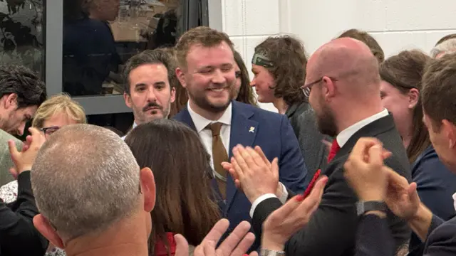 Lincoln's Labour candidate Joshua Wells is surrounded by applause