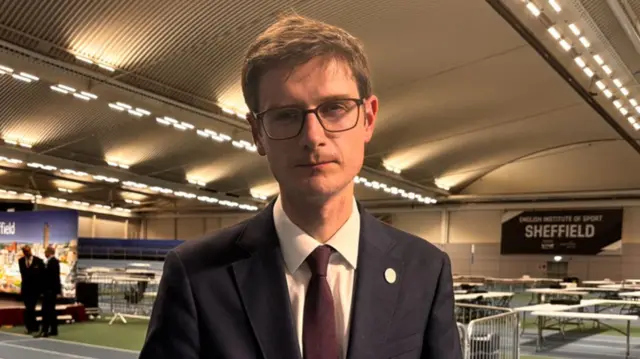 Tom Hunt after the election count, he wears glasses and a suit