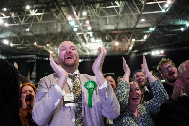 Green Party members celebrate