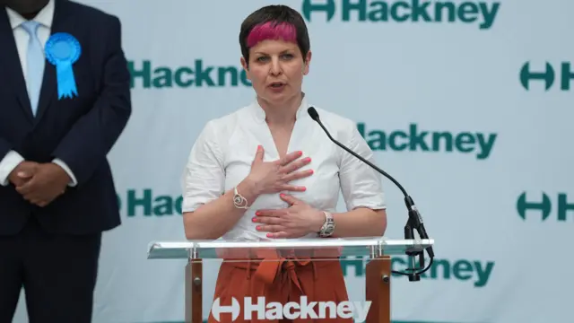 Green Party candidate Zoe Garbett gives a speech after being declared the winner