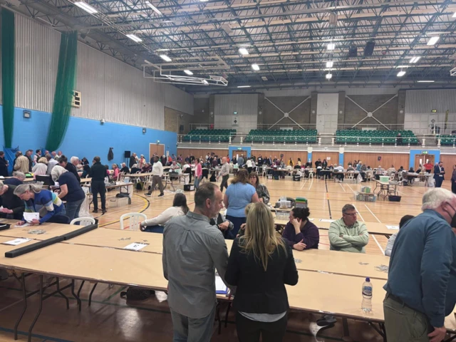 ballots laid out on tables at the Cheltenham Borough Council elections