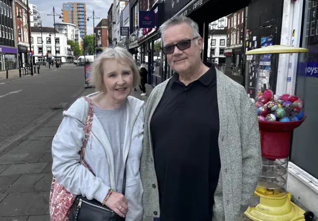 Kim and Lenny in Romford on a street