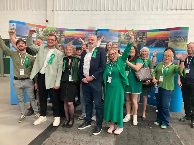 Green Party councillors and supporters celebrate at election count
