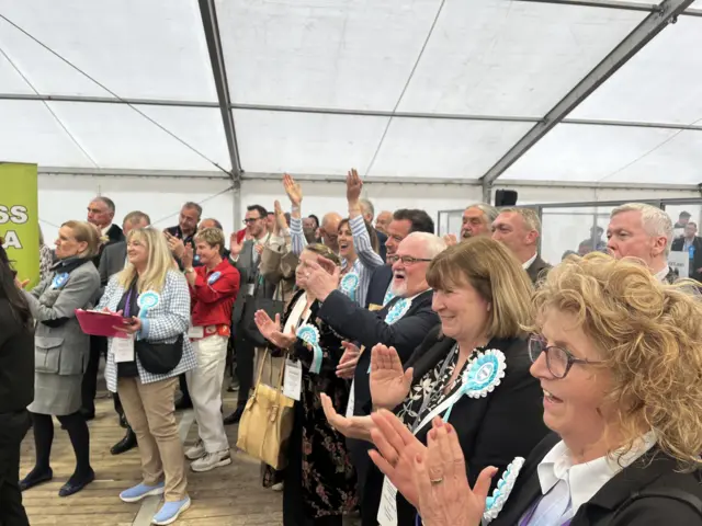 Reform supporters celebrating another council seat going their way.