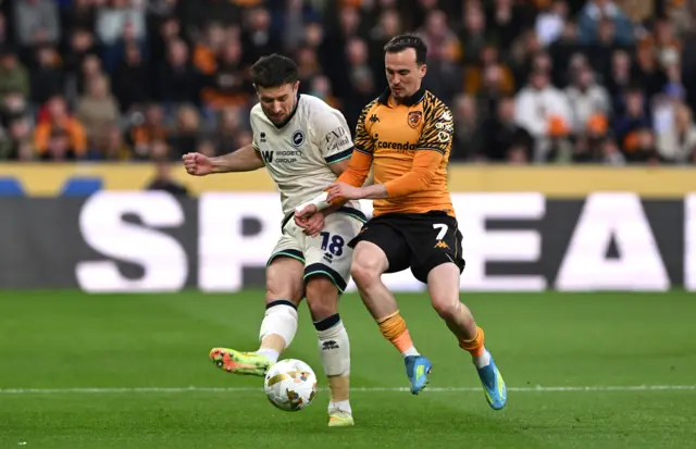 Ryan Leonard of Millwall and Liam Millar of Hull City