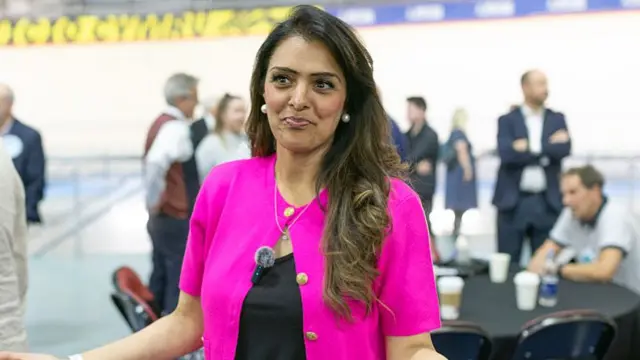 Natasha Asghar wearing a pink top