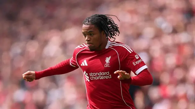 Rio Ngumoha of Liverpool runs with the ball during the Premier League match between Liverpool and Chelsea at Anfield