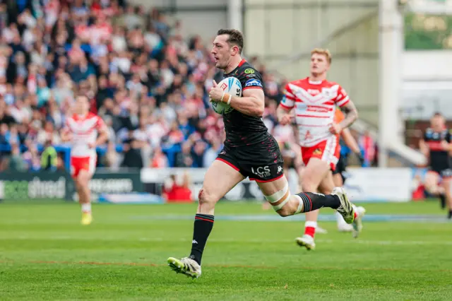 Jake Wardle runs in for Wigan's fourth try