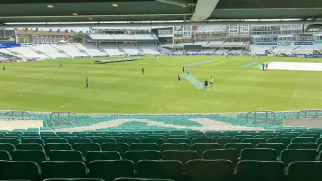 Cricket being played on the pitch at the Kia Oval