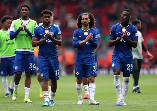 Andrey Santos, Marc Cucurella and Moises Caicedo of Chelsea acknowledge the fans