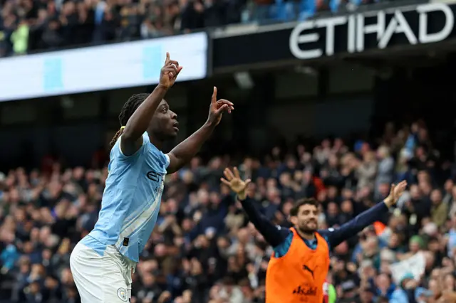 Doku celebrates a goal