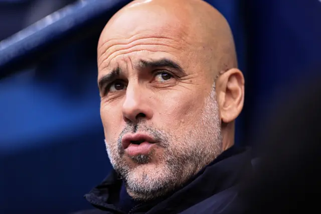 Manchester City manager Pep Guardiola puffs his cheeks