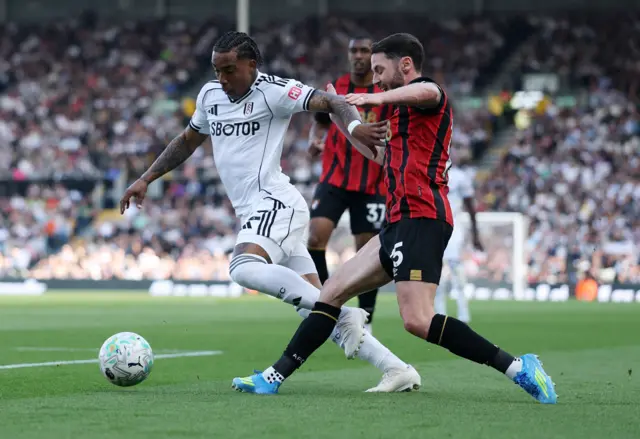 Fulham's Kevin in action with AFC Bournemouth's Adam Smith