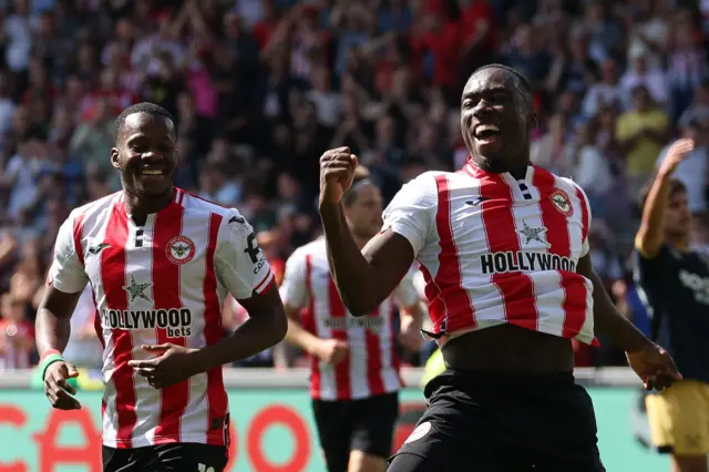 Michael Kayode celebrates