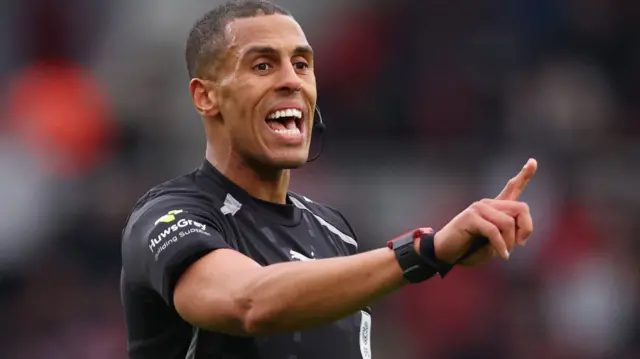 Referee Farai Hallam