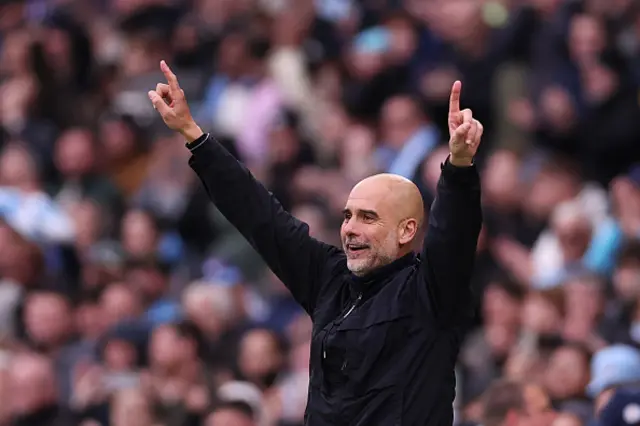 Pep Guardiola, Manager of Manchester City, celebrates