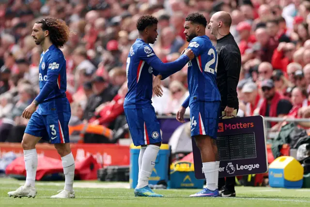 Reece James of Chelsea receives the captains armband as he prepares to enter the pitch during the Premier League match between Liverpool and Chelsea