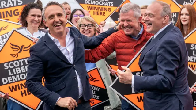 Alex Cole-Hamilton, Willie Rennie and Ed Davey with Lib Dem MSPs