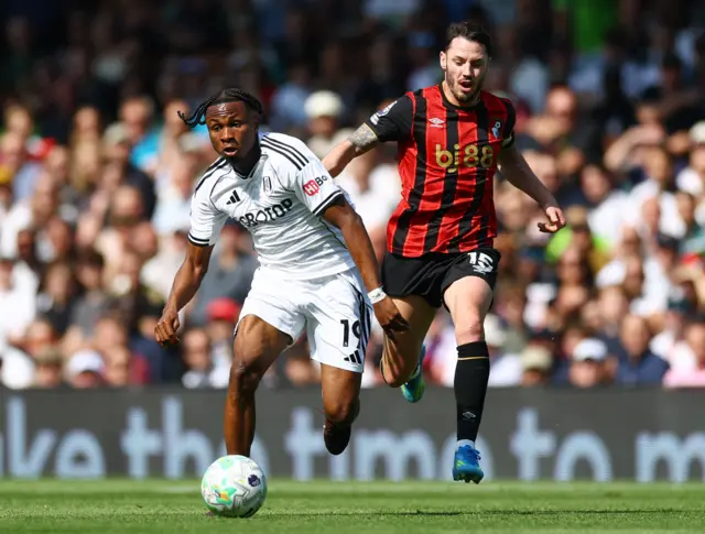 Fulham's Samuel Chukwuze in action with AFC Bournemouth's Adam Smith