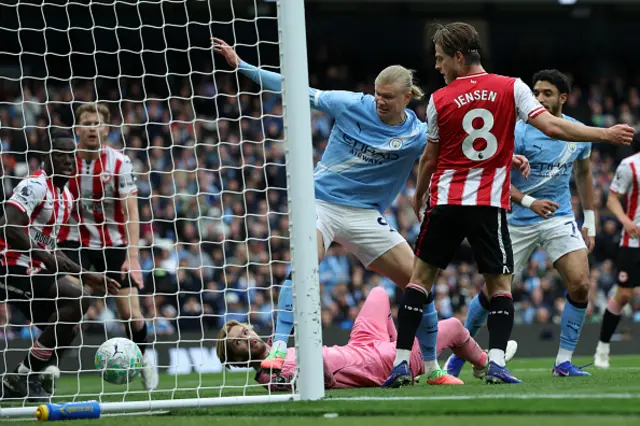 Erling Haaland (C) scores their second goal
