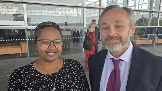 Safa Elhassan and Gwyn Williams looking at the camera